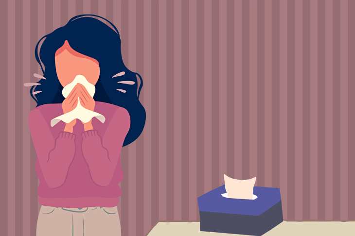 image of woman sick with head cold or bronchitis