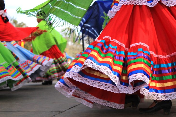women dressed in ballet folklorico dresses