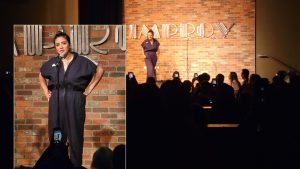 Photo of Cristela Alonzo doing her show at the Houston Improv in front of a crowd
