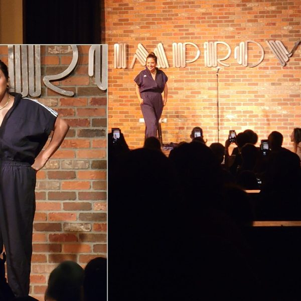 Photo of Cristela Alonzo doing her show at the Houston Improv in front of a crowd